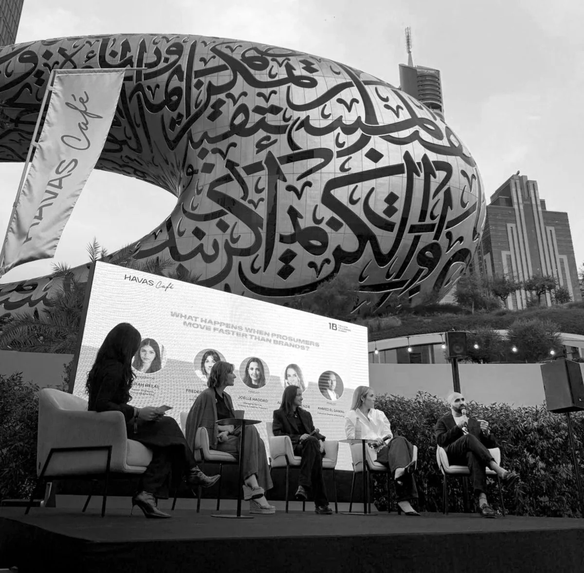 Ahmed El-Gamal on a panel on an outdoor stage beneath the Museum of the Future in Dubai